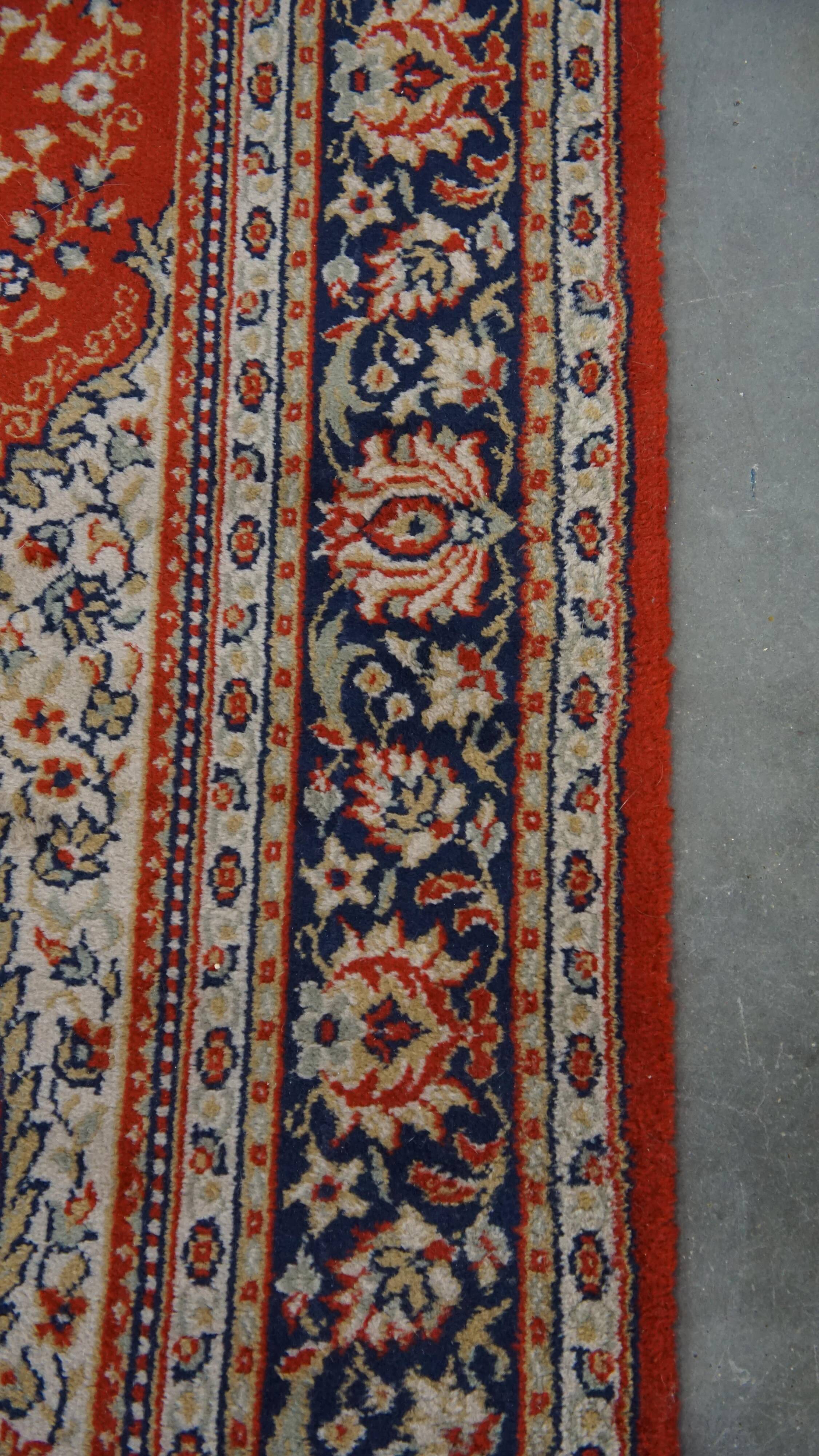 Vintage oriental rug in predominantly red/beige tones with a stunning pattern, 236x170 cm