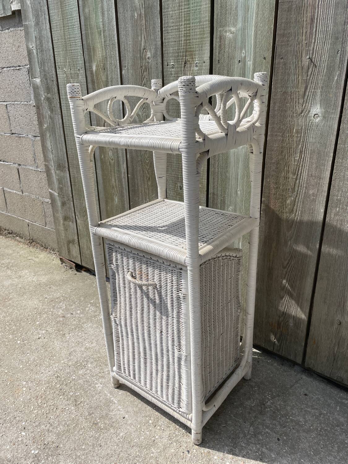 Small white wicker bathroom shelf