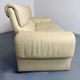 Two-seater designer sofa De Sede DS-2011 in cream leather with adjustable backrest.