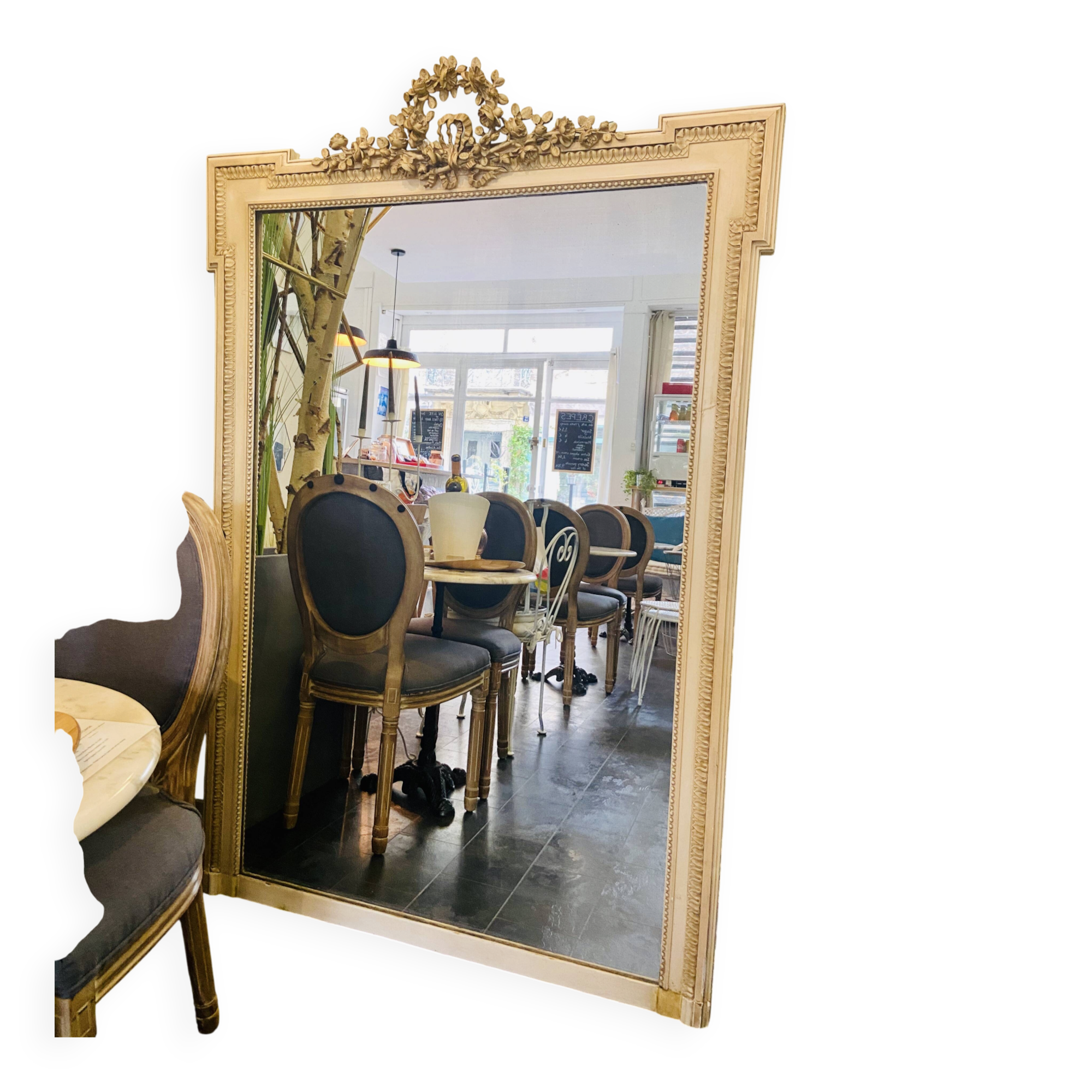large antique mirror with richly carved pediment in Louis XV / Napoleon style