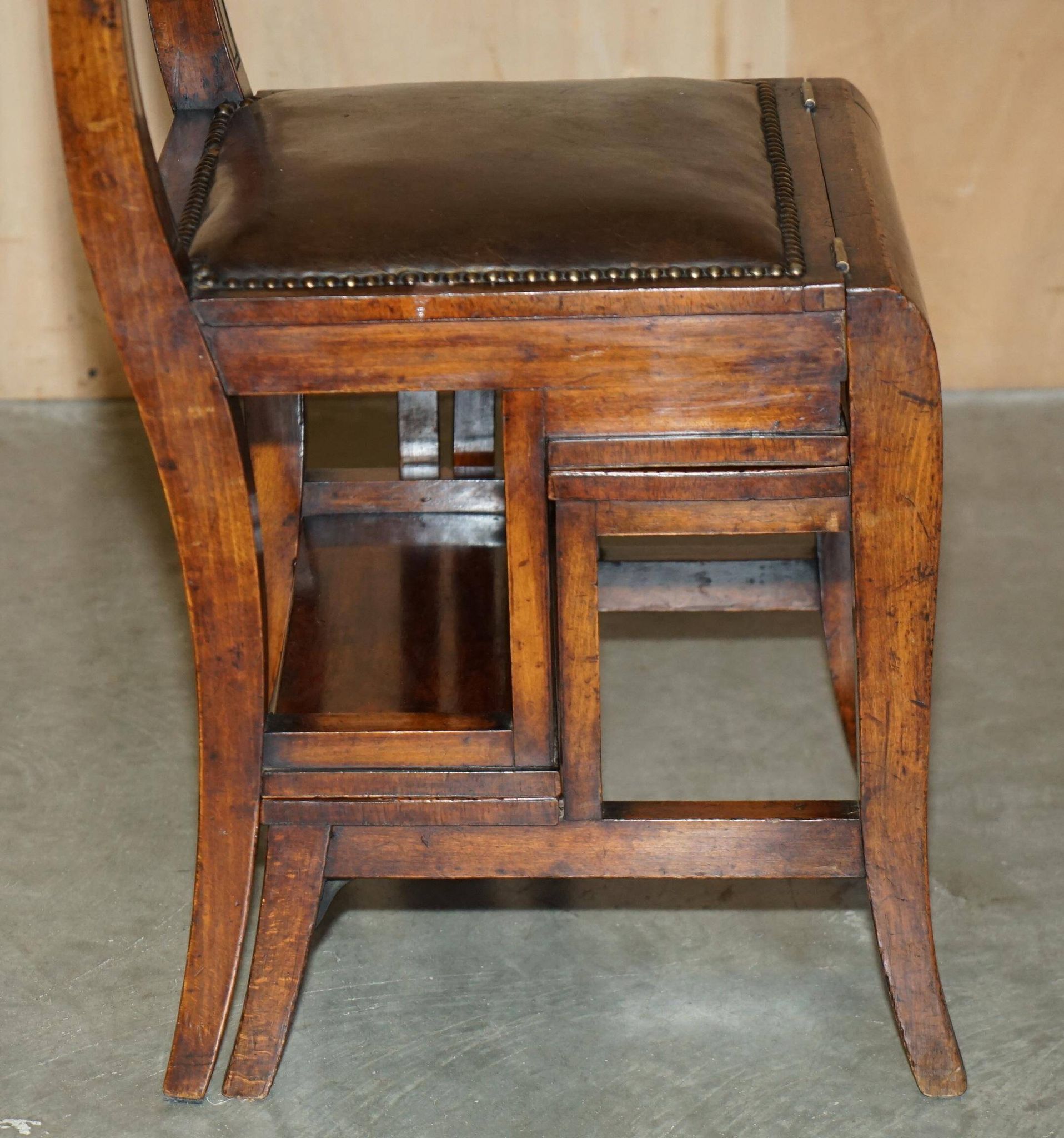 Victorian library chair, convertible, hardwood, leather, brass, circa 1880.