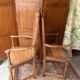 Pair of carved walnut armchairs in Renaissance style
