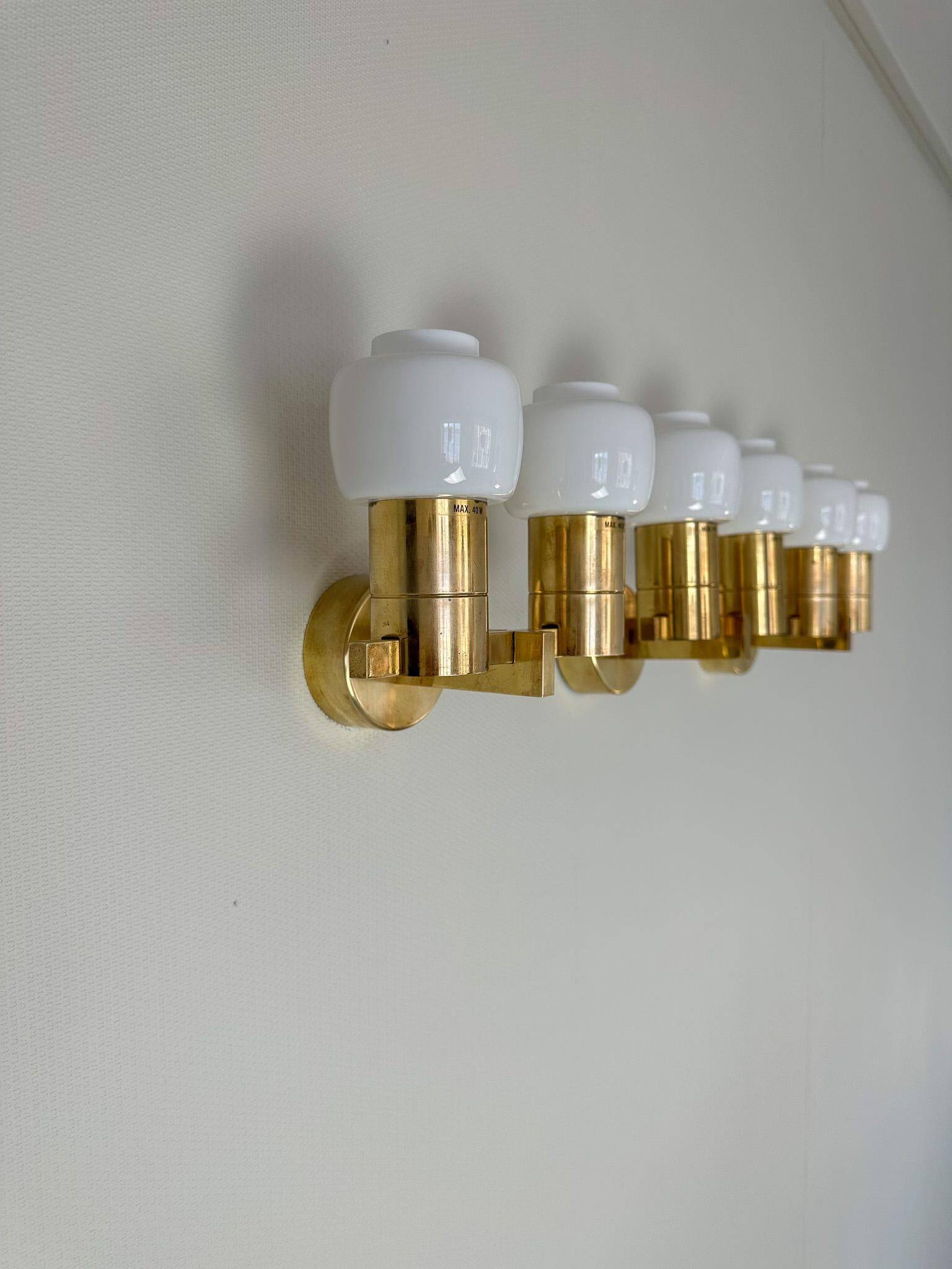 Brass and opaline glass wall lamps by Hans-Agne Jakobsson in mid-century style, Sweden, 1960s.