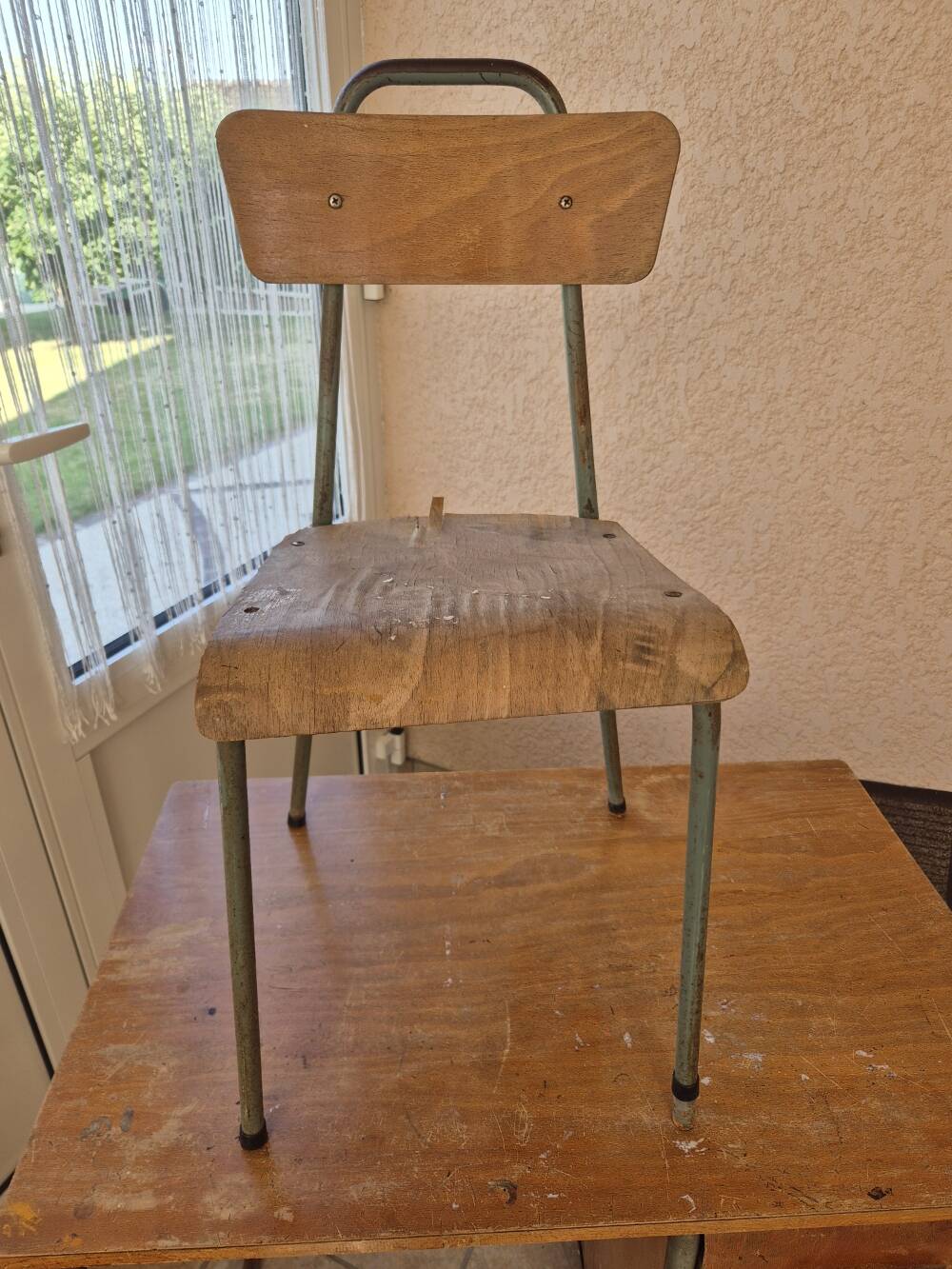 Child's desk with chair in its original condition.