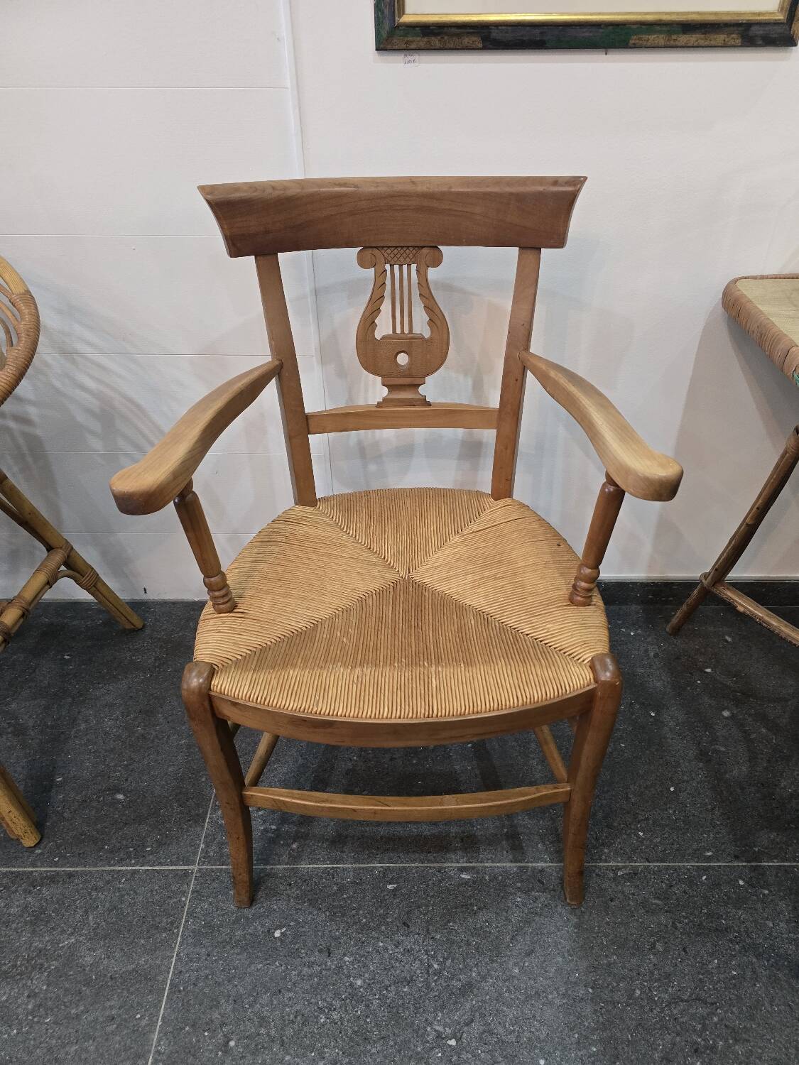 Pair of antique lyre-shaped armchairs – woven straw seats