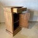 Bedside table or small storage unit in natural wood – country style