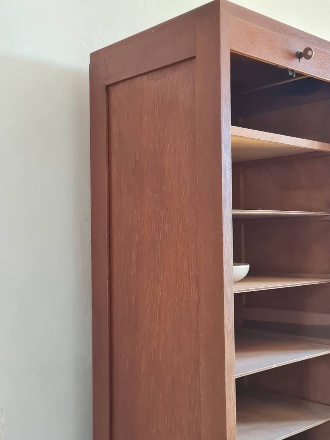 Vintage double curtain filing cabinet.