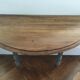 Antique painted wooden half-moon console table