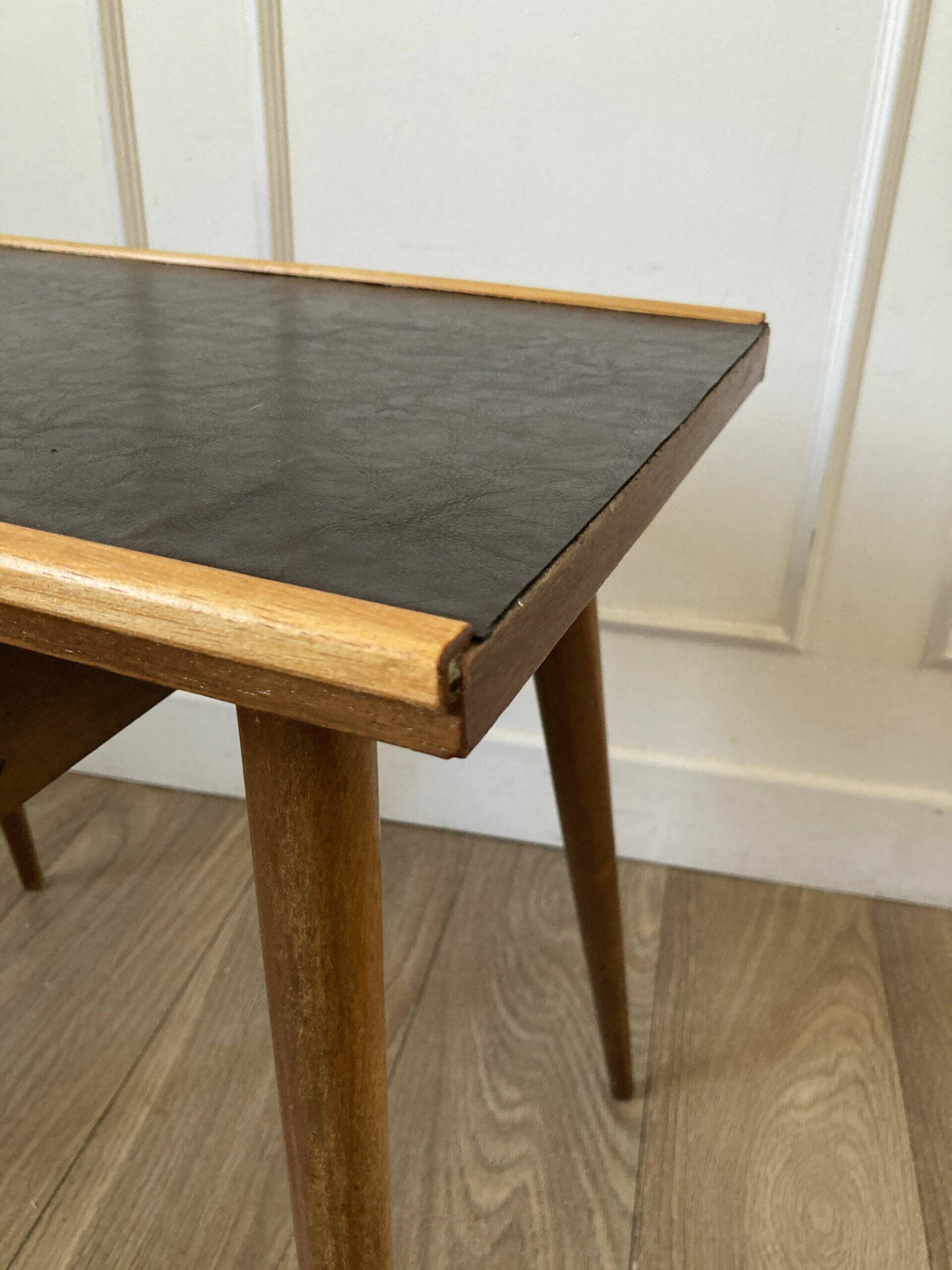 Vintage bedside table with compass feet