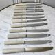 set of 12 bakelite knives from the 60s