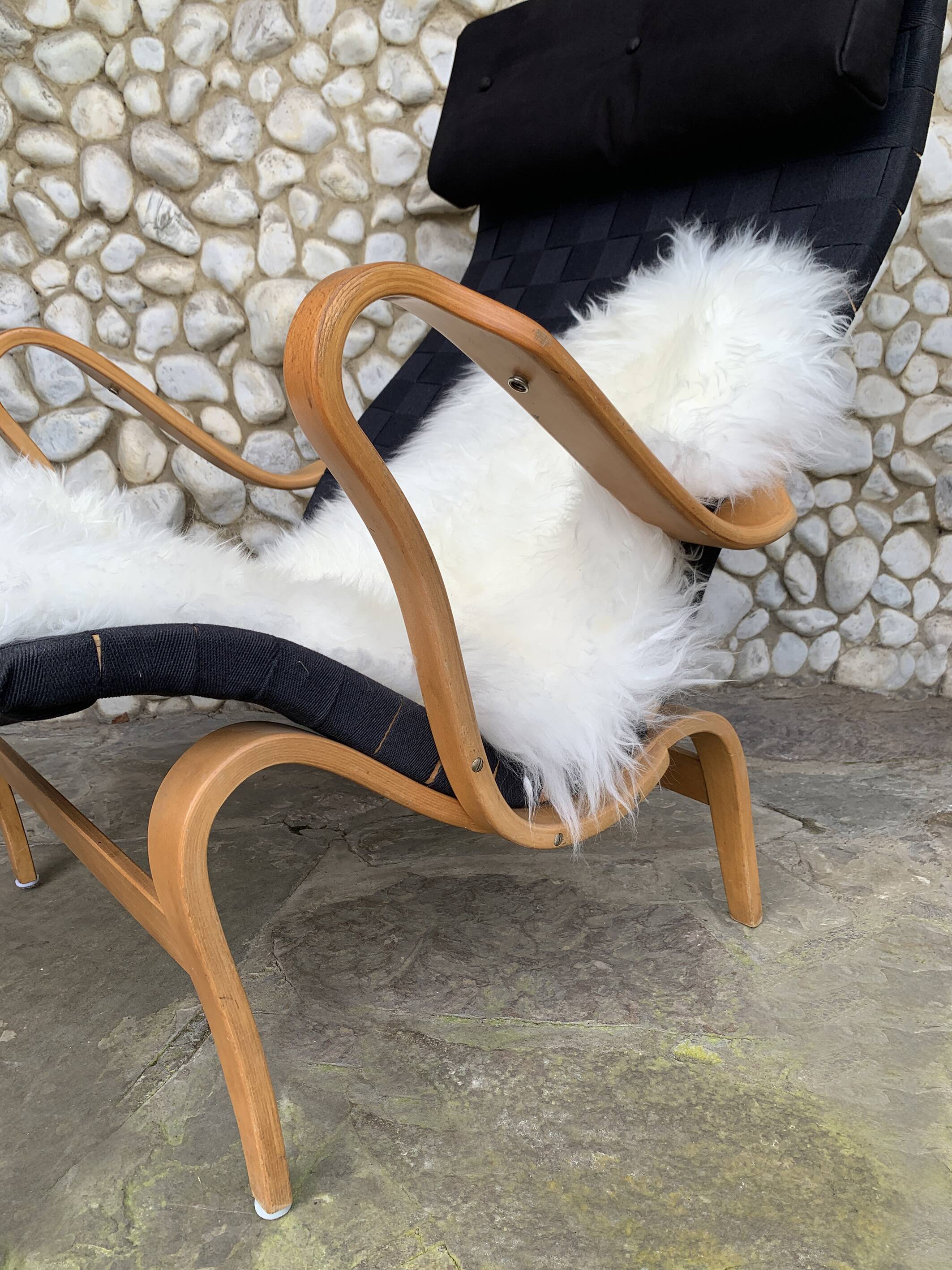 Pernilla armchair in black canvas by Bruno Mathsson, Dux, Sweden 1970