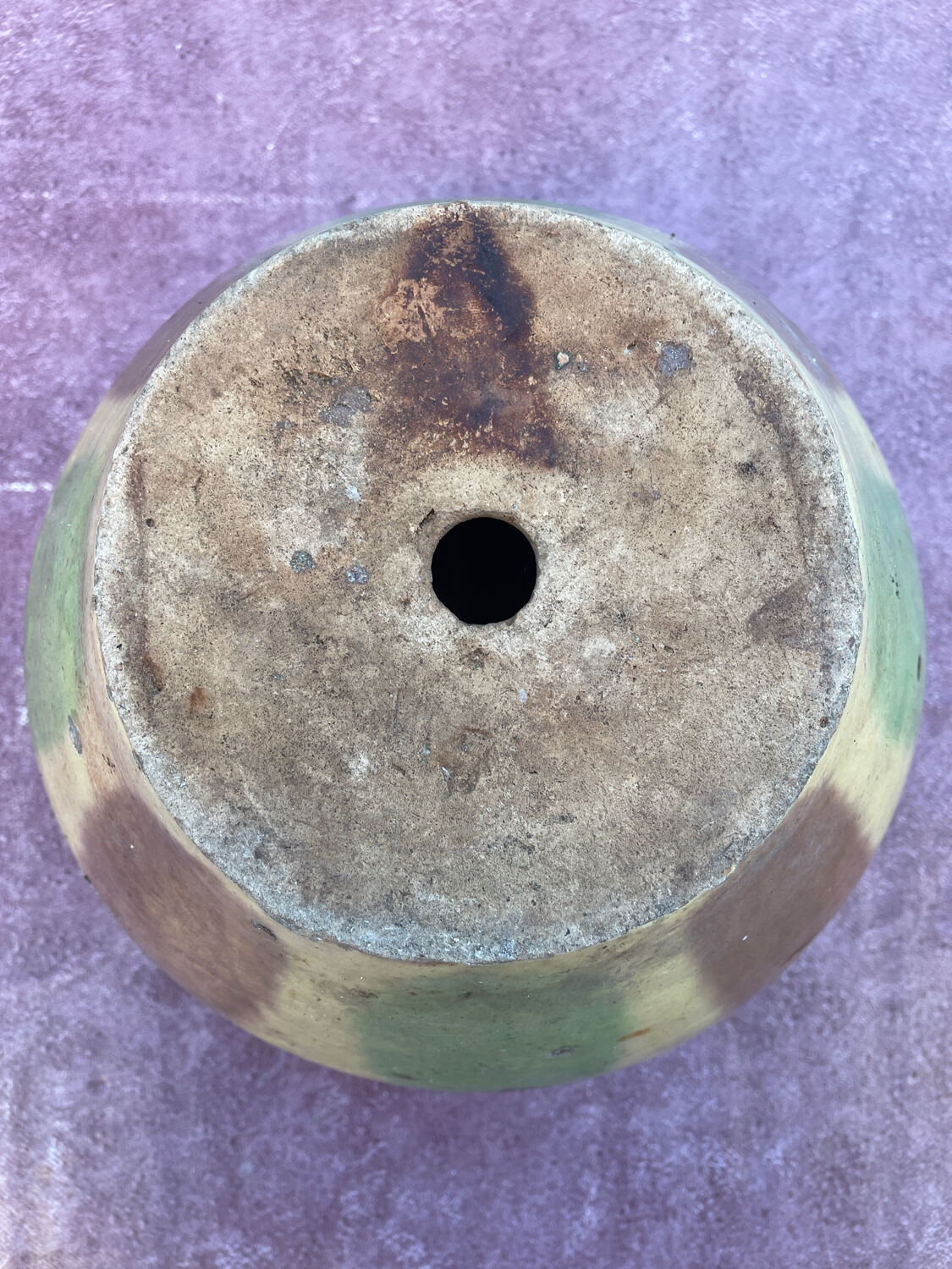 Old terracotta flower pot varnished