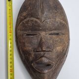 Dan mask in carved wood, brown patina, Ivory Coast, 25 cm