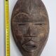 Dan mask in carved wood, brown patina, Ivory Coast, 25 cm
