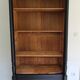 Old library storage unit shelf cabinet curiosities vintage black linen