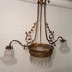 Gold metal chandelier and three-light beads