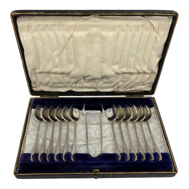 Service of 12 silver-plated metal coffee spoons with tongs and box from around 1900.