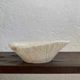 Empty pocket in vintage alabaster