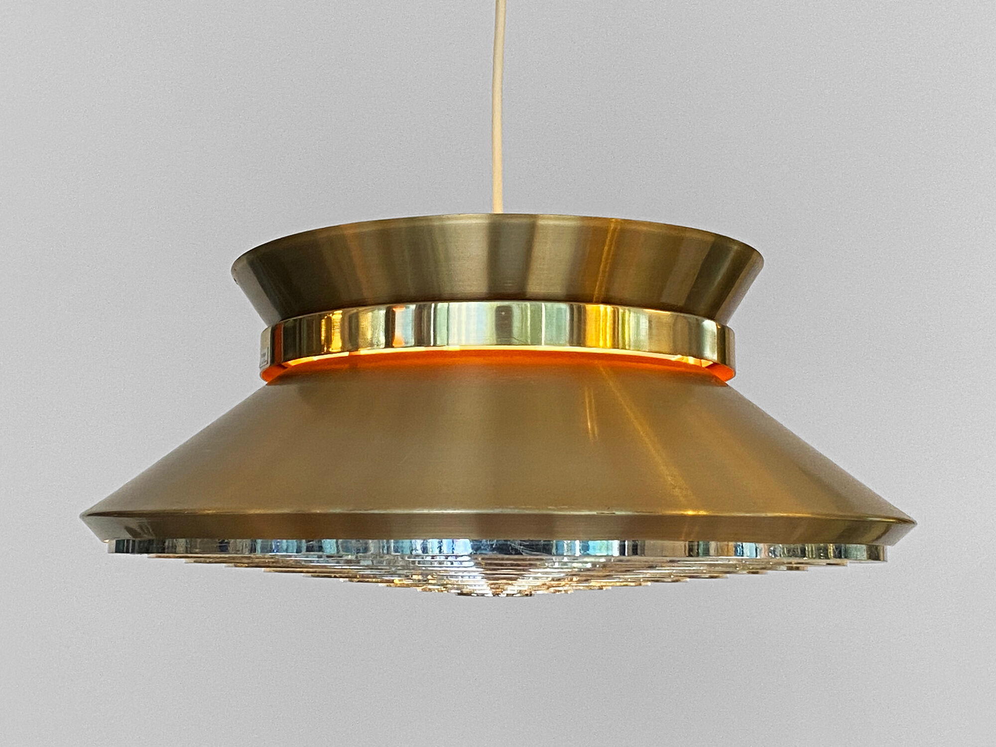 Brass colored aluminium pendant light by Carl Thore for Granhaga Metall. Sweden 1970s.