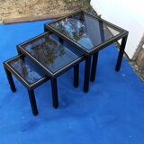 Black nesting tables by Pierre Vandel