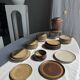A small stoneware bowl, brown exterior, speckled grey interior D15