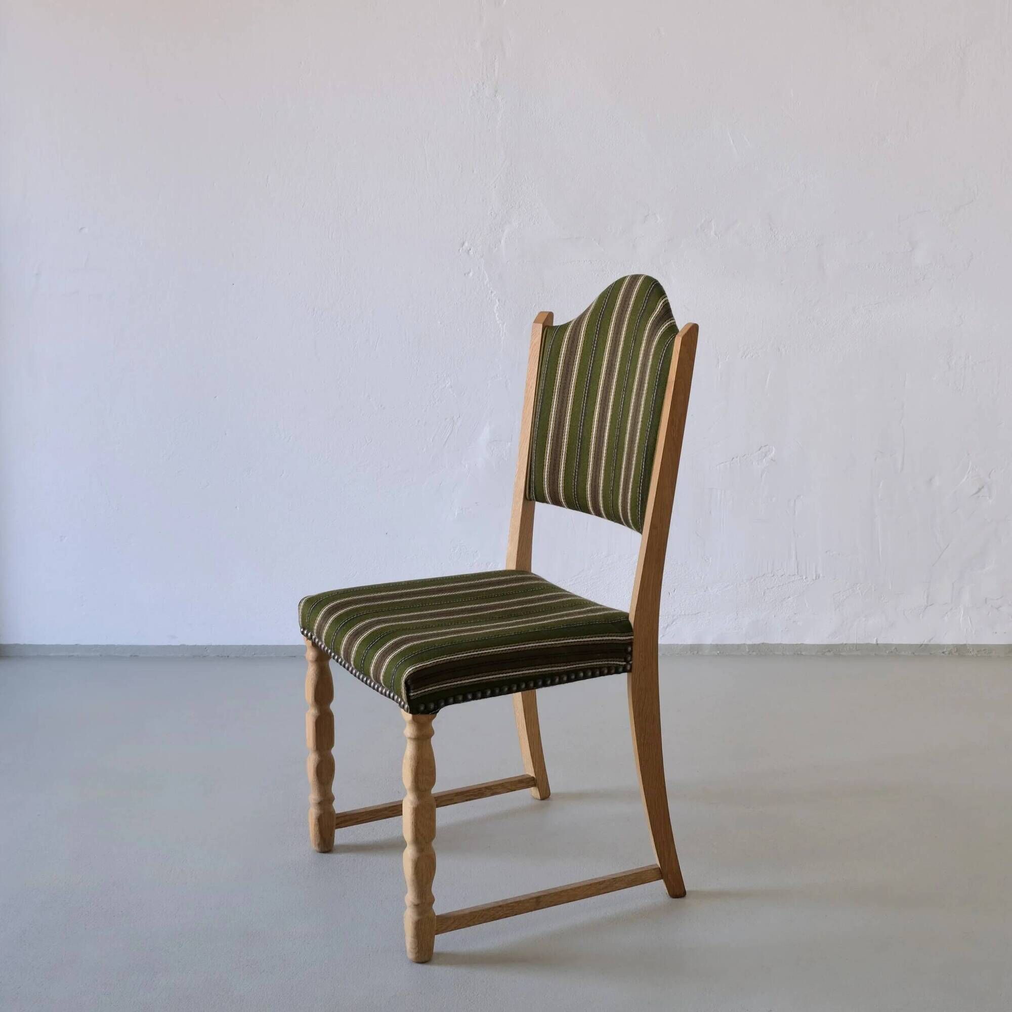 Henning Kjaernulf carved oak dining chairs | set of 6 | Denmark | 1950s