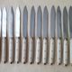 Set de 12 couteaux de table Vintage inox bakélite et laiton