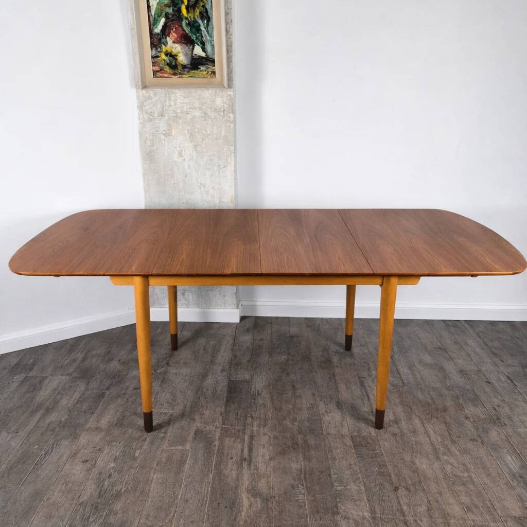 Rare teak and maple dining table with 2 extensions by Finn Juhl for Søren Willadsen, Denmark, 1960.