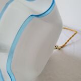 Draped opaline suspension