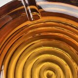 Amber pressed glass ashtray, 1970s design.