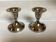 Pair of small silver beaded metal candle holders.