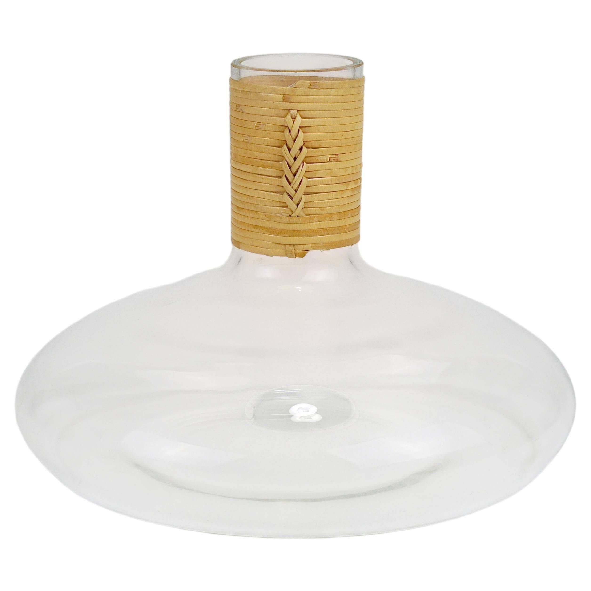Vase by Carl Auböck decanter "Tuberkulinkolben" tall in rattan, Austria, 1950s.