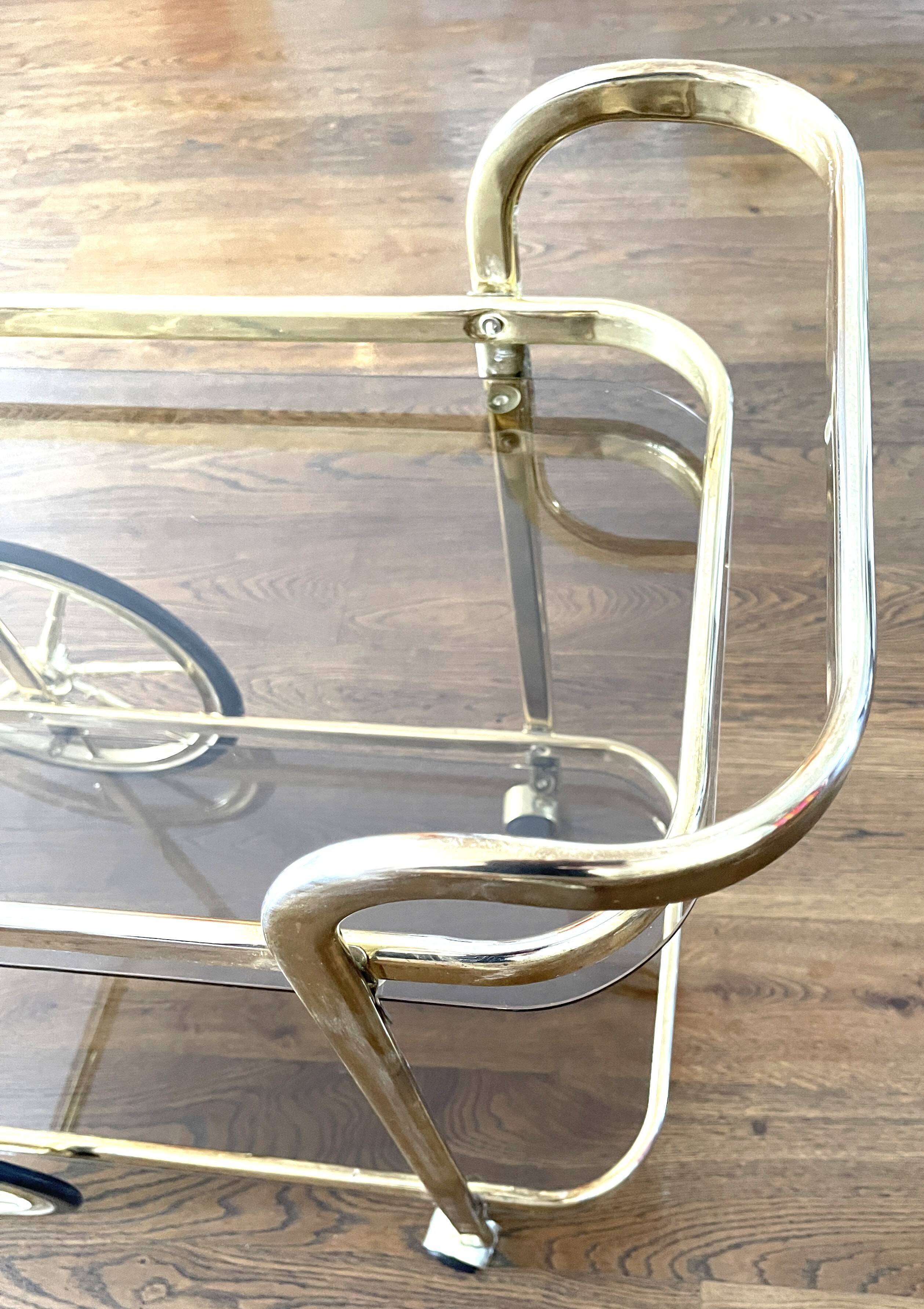 Brass and smoked glass bar trolley, 2 trays