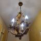 Set of 3 gold painted metal chandeliers