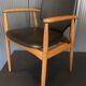 A Scandinavian teak skai chair from the 1960s for a vintage desk table.