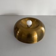 Flush-mounted disc-shaped brass fixture from the mid-century, 1960, Italy.