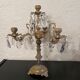 Duo of bronze chandeliers with tassels