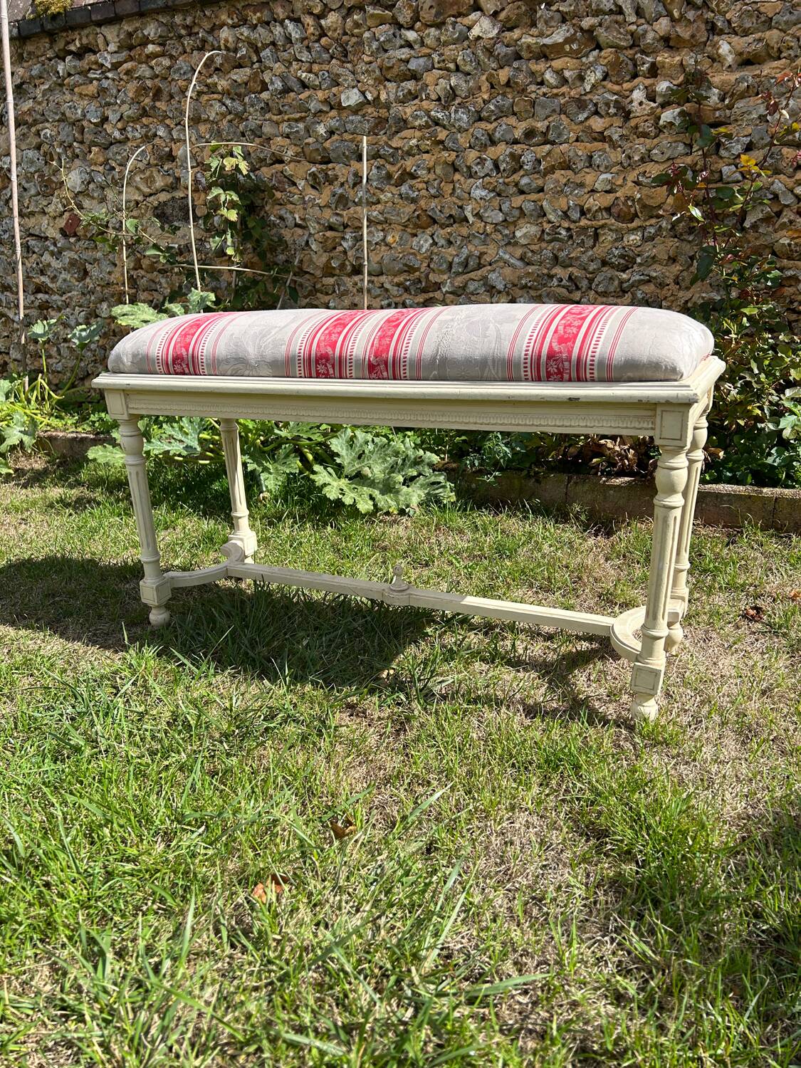 Louis XVI style bench at the end of the bed