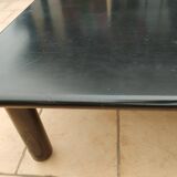 Old vintage wooden coffee table with tubular base