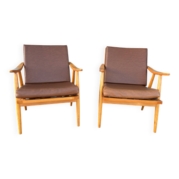 Pair of vintage armchairs with compass legs, "Boomerang" model by THO editions.