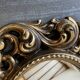 Vintage convex witch mirror – carved gilded wood – 1960s