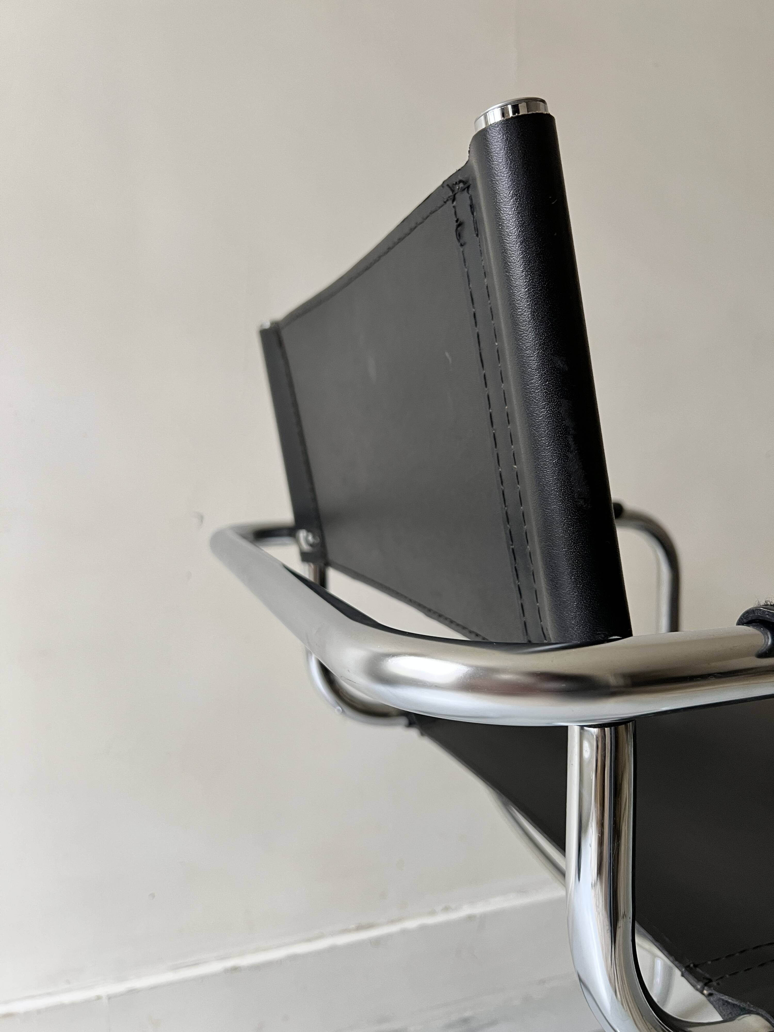 Chrome and black leather armchair