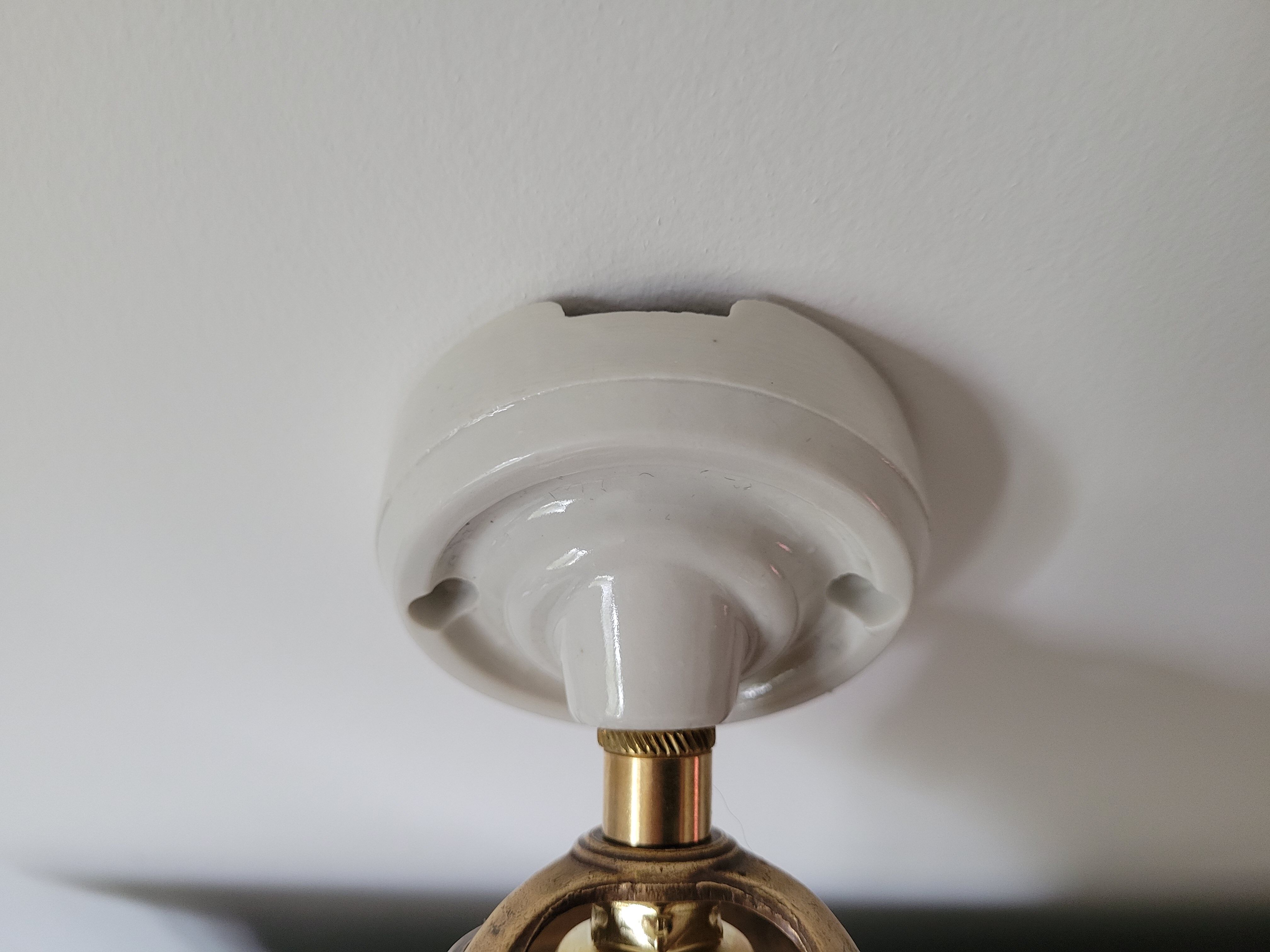 Porcelain wall lamp and Holophane style glass