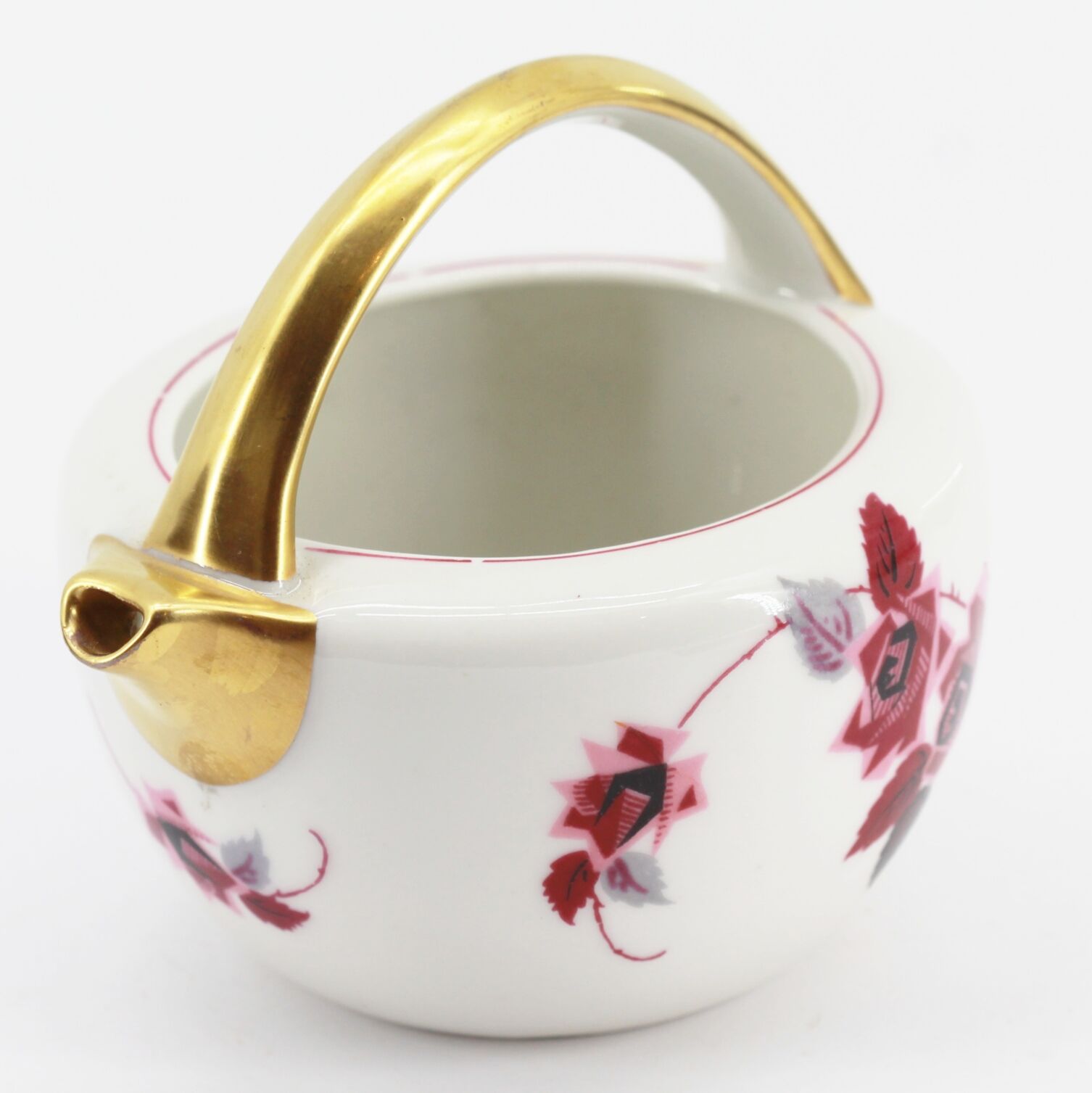 Antique porcelain teapot pourer