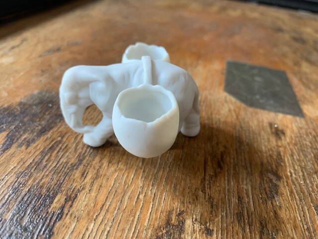 Small elephant in biscuit porcelain, 19th century salt cellars
