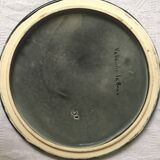 Underside of flat ceramic pink flowers La Roue de Vallauris