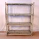 Teak bookshelf with original off-white patina.