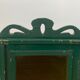 Wall vitrin with pediment