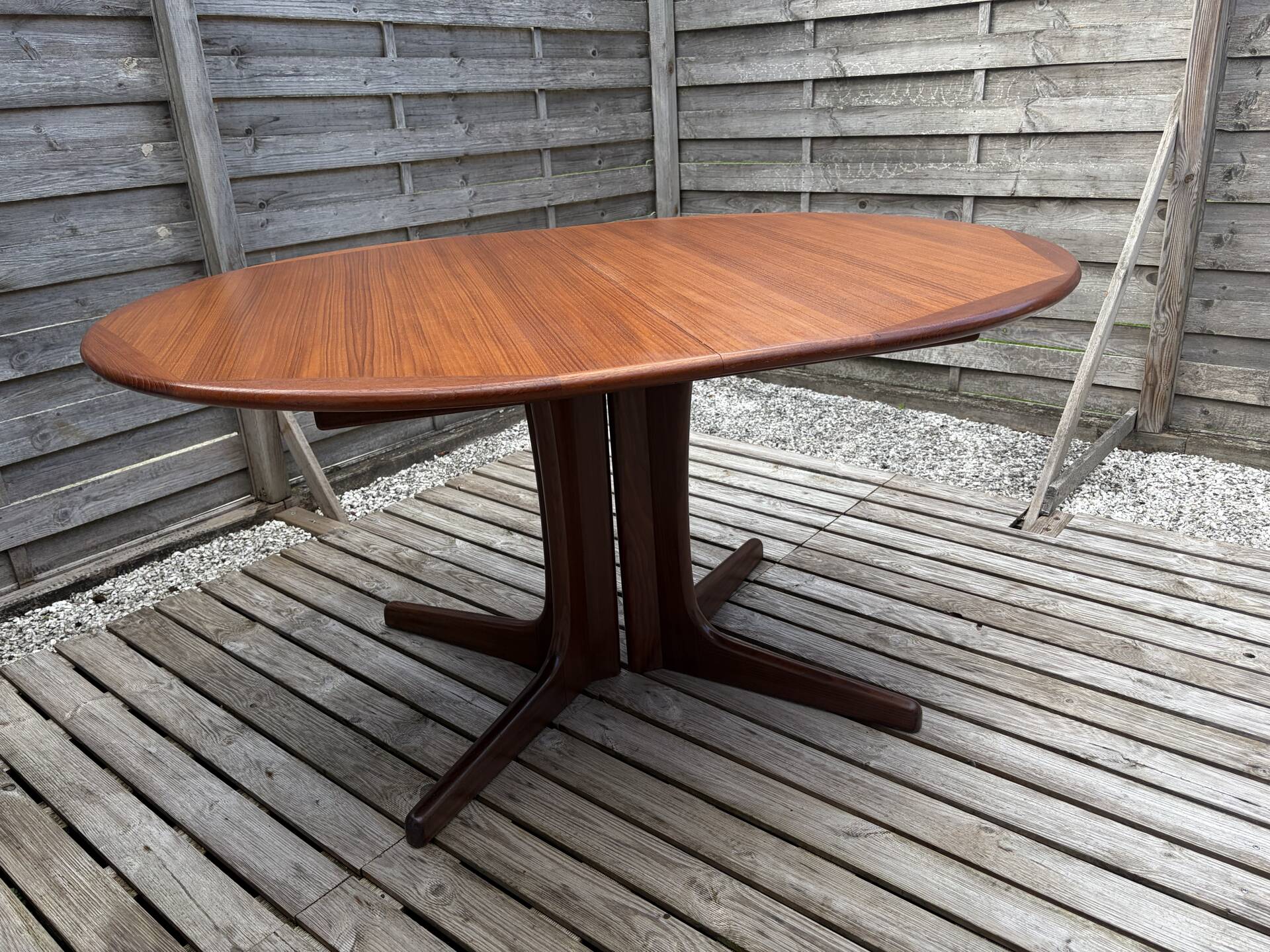 Oval teak table extendable with two leaves, Baumann style.