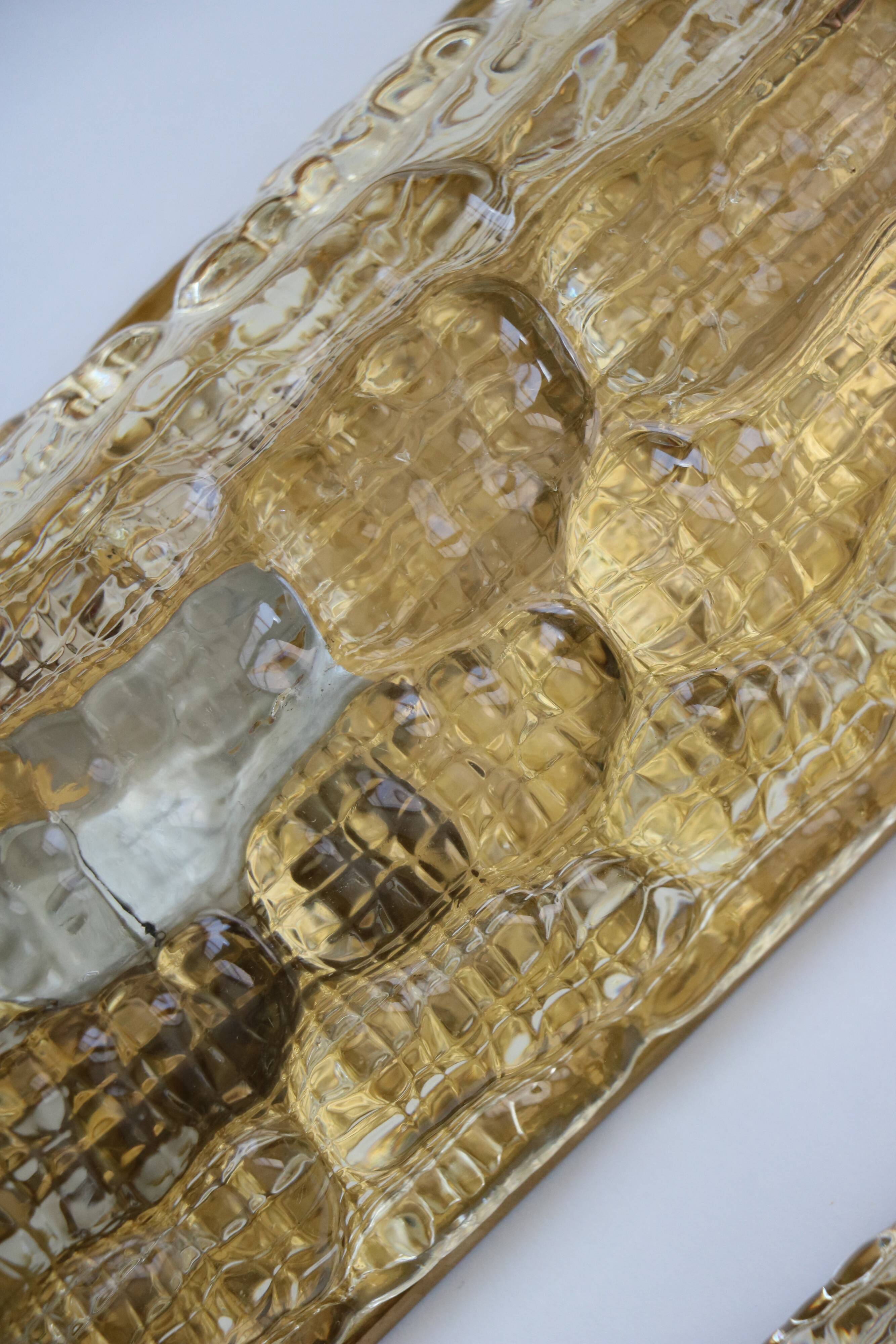 Pair of glass and brass wall lights by Carl Fagerlund for Orrefors, 1960.